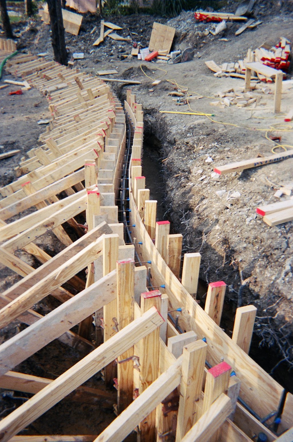 Curved concrete formwork at construction site