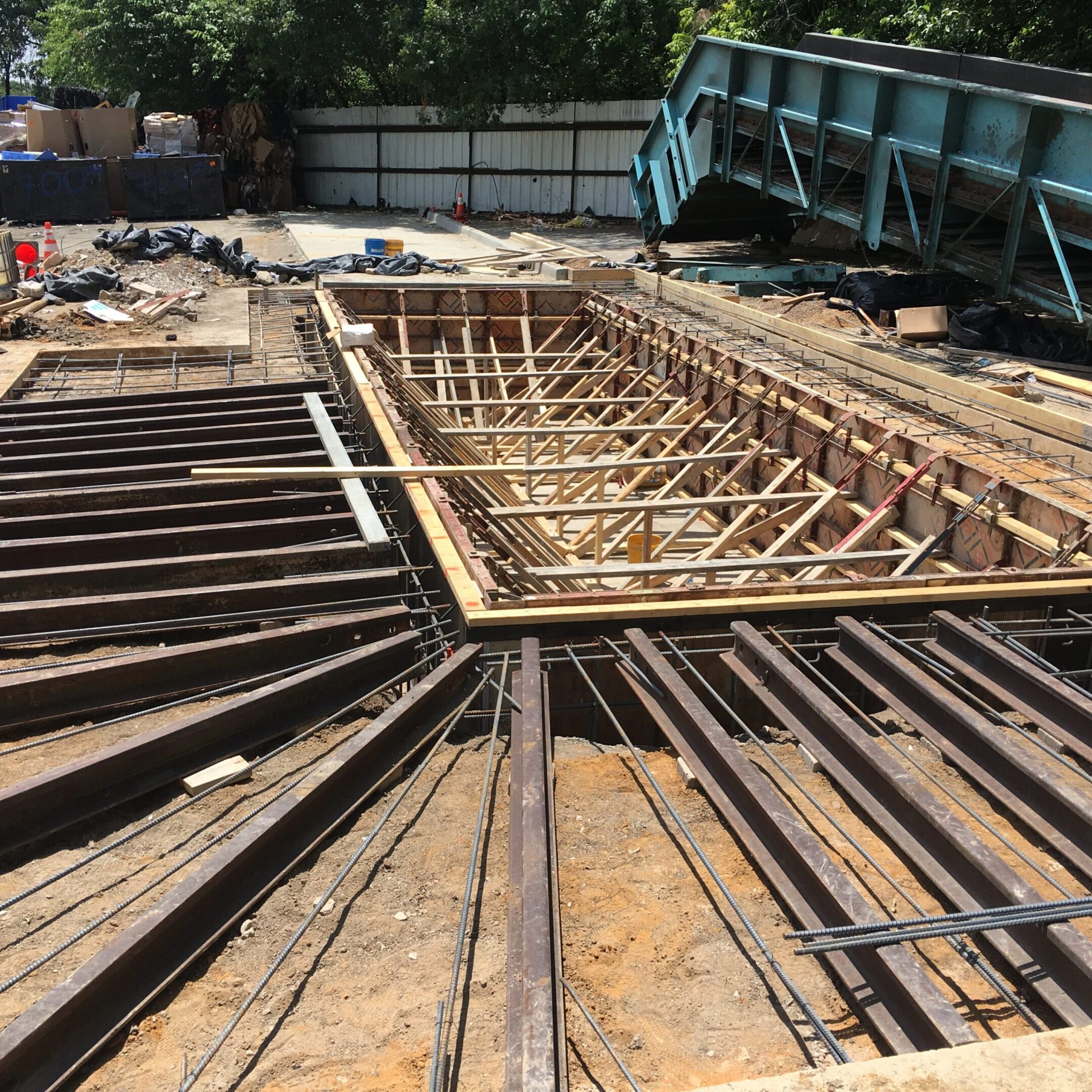 Construction site with steel beams and rebar